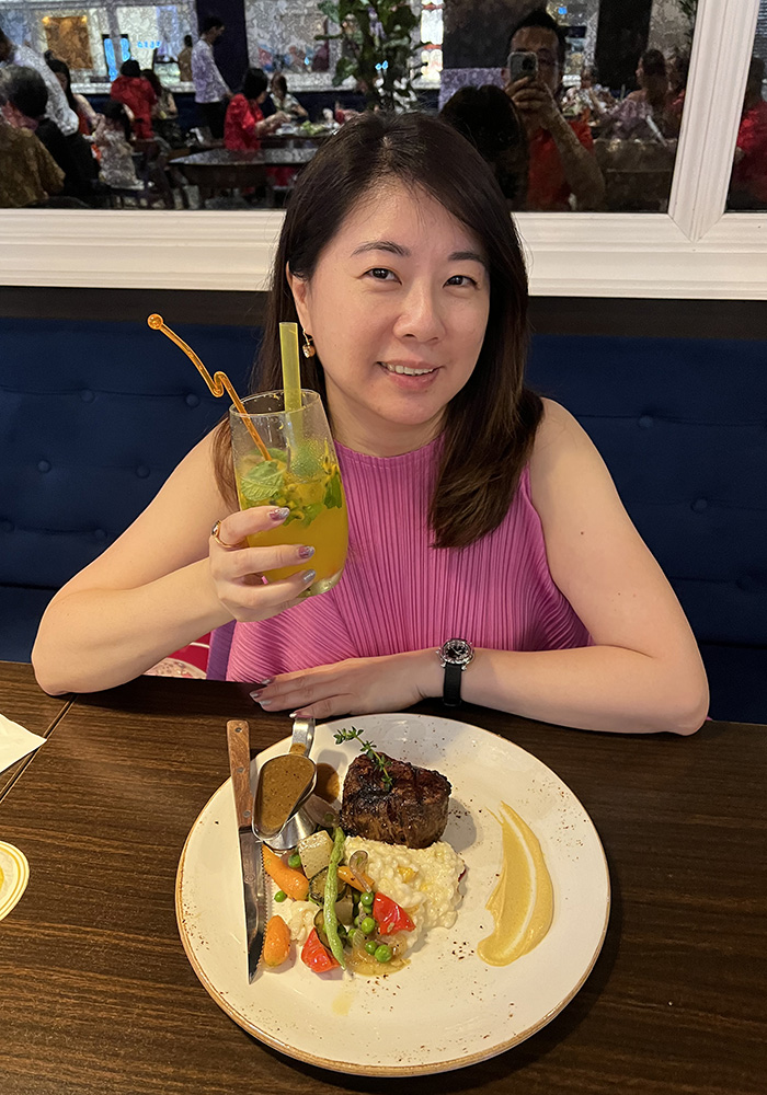 Desiree Huang enjoying a meal