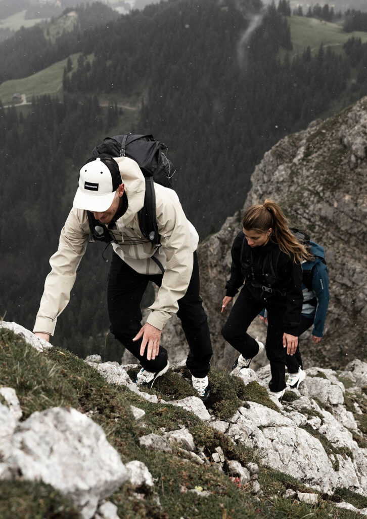 Two people hiking in the mountains.