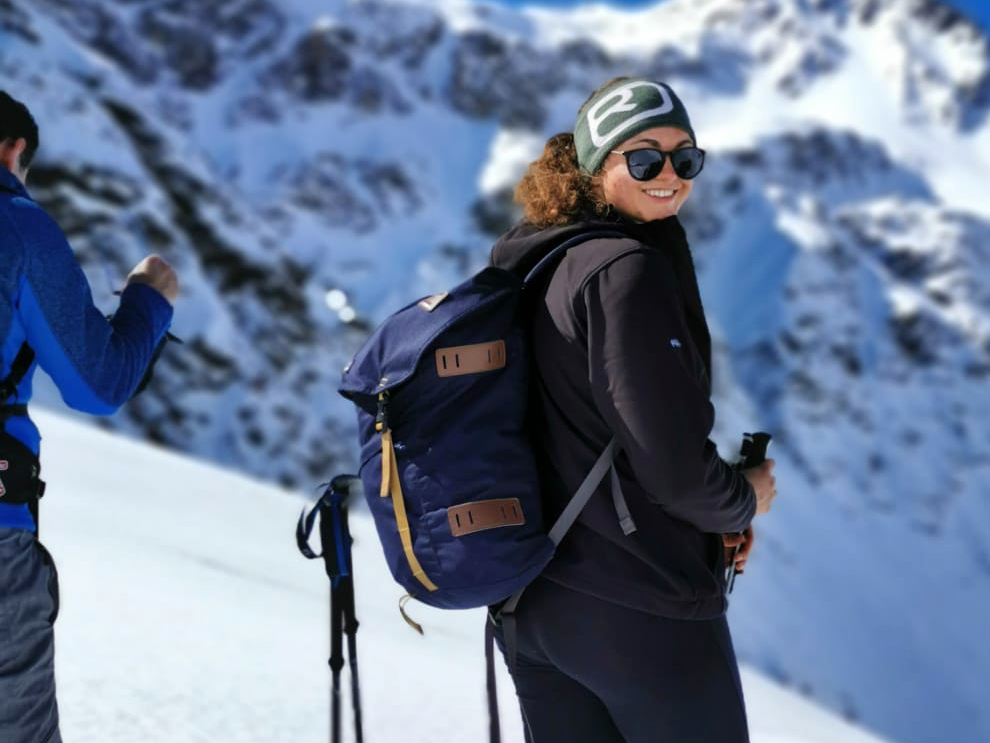 Anita skiing in the mountains
