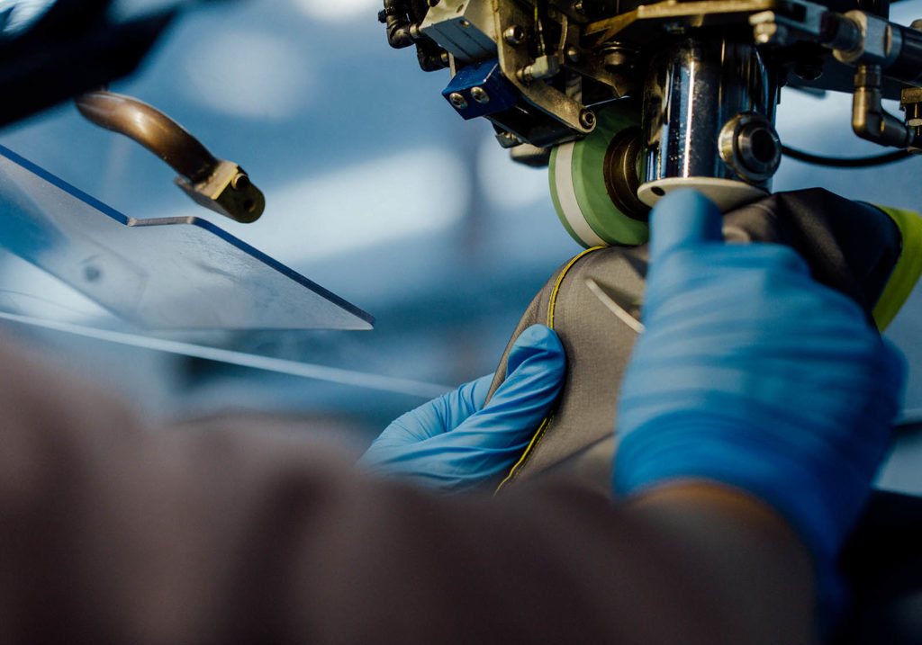 Hands of an employee working at Arc'one ReBird Service center