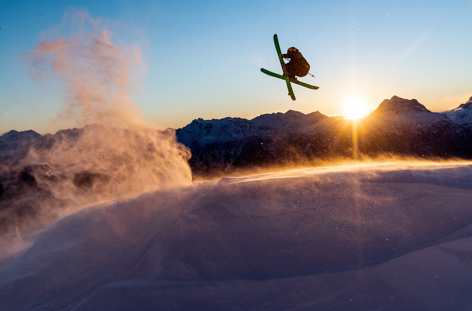 A person jumping with Armada skiis