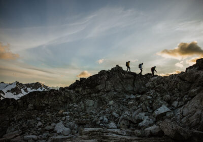 Three people hiking on the mountain