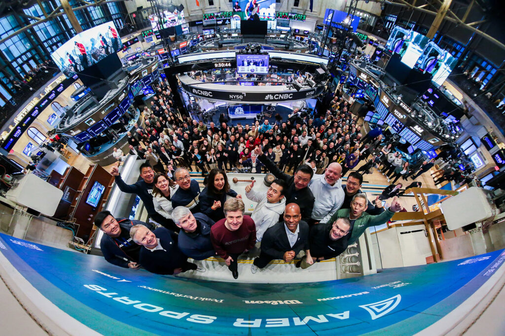 Amer Sports executives and guests on the NYSE trading floor