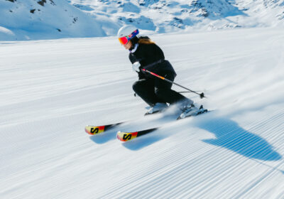 Alpine skier skis down the slope