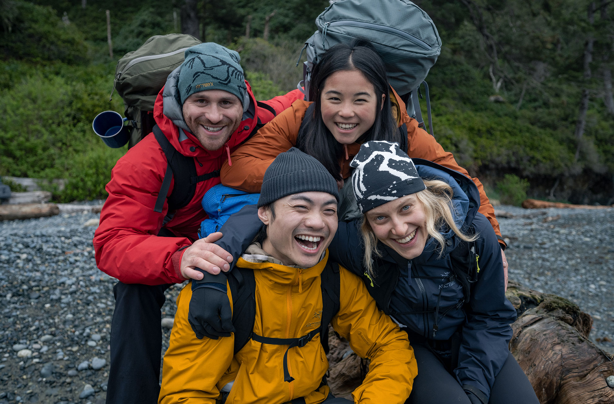 Four hiker smiling and wearing Arc'teryx gear