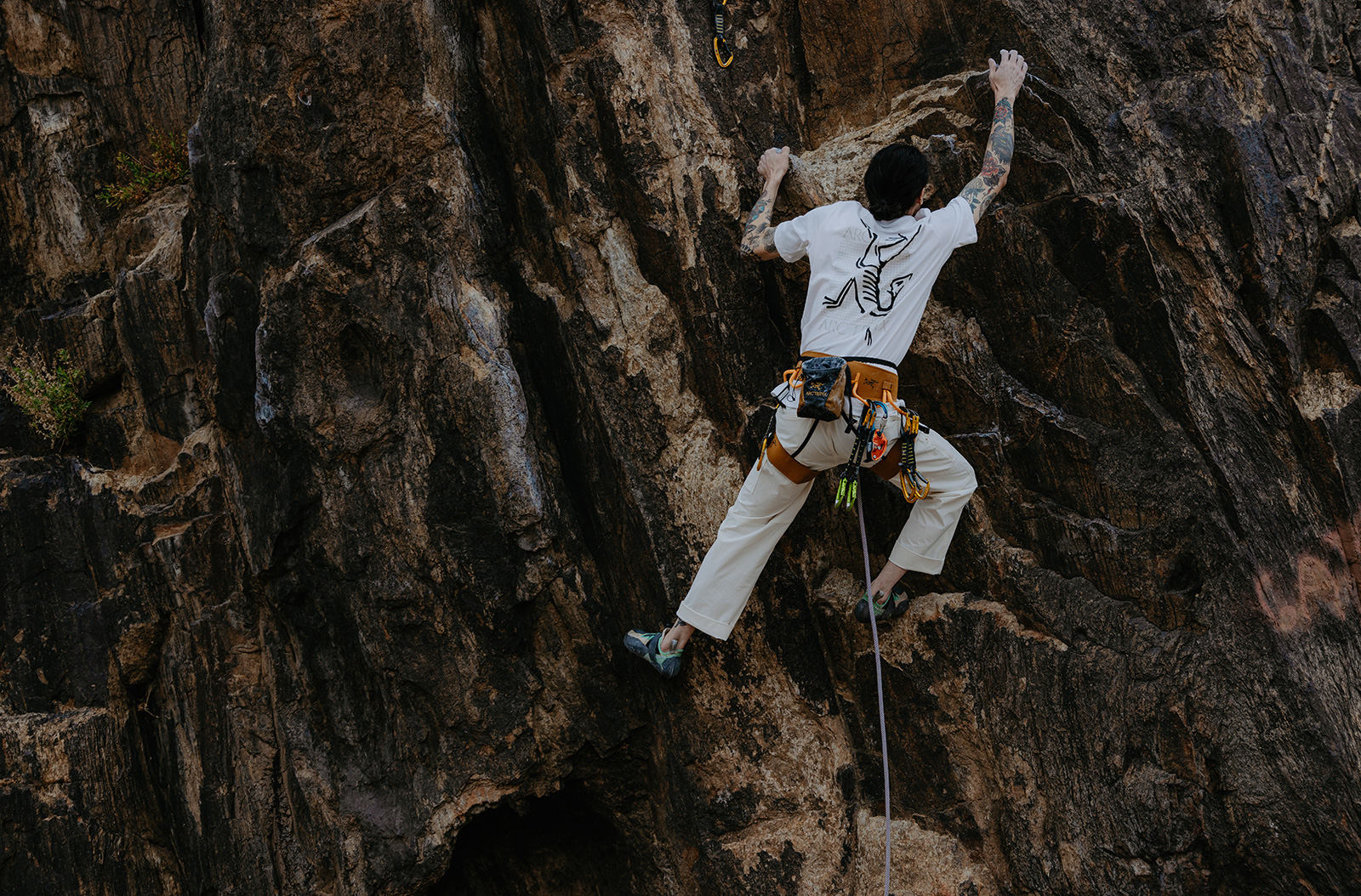 A person climbing a mountain.