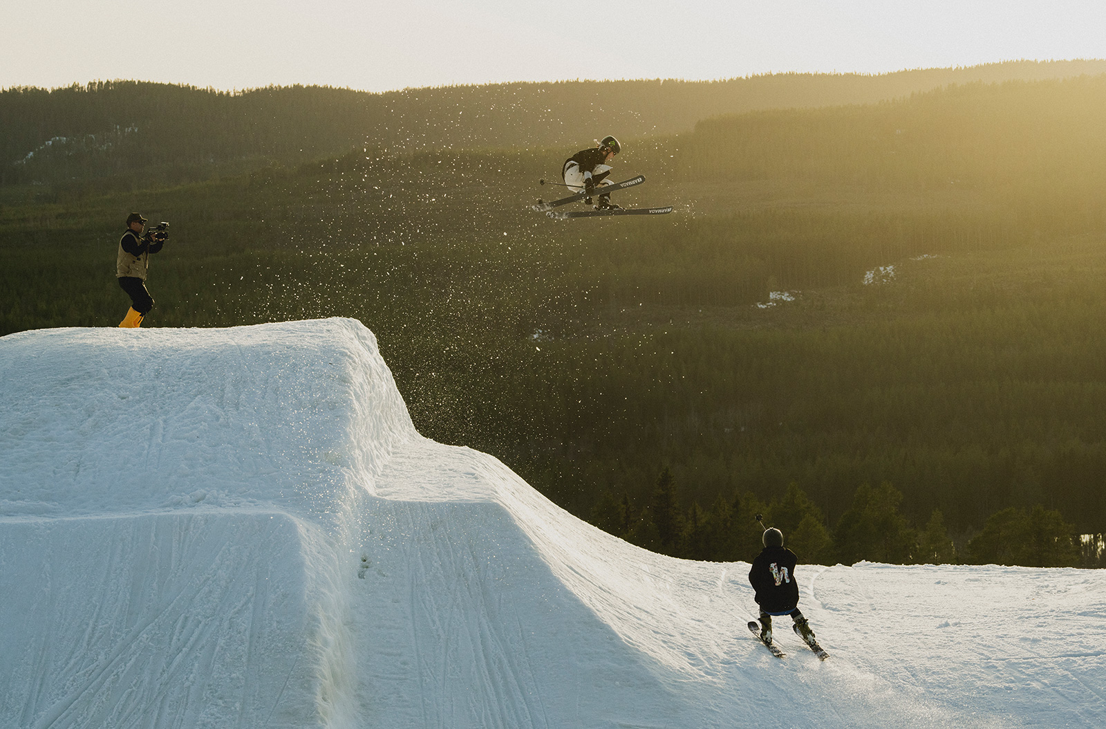 Two people skiing.