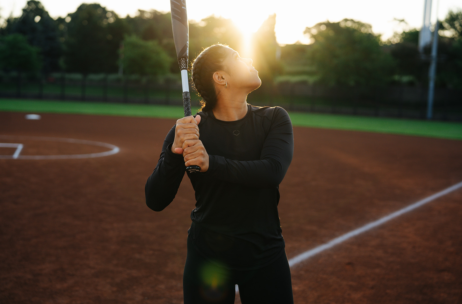A person holding a baseball bat.